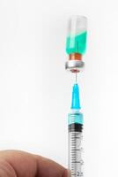 syringe isolated on white background photo