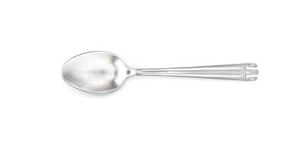Old silver spoon isolated on white background photo