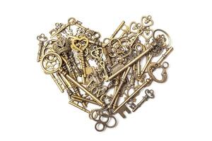 Old, vintage keys in the shape of a heart photo