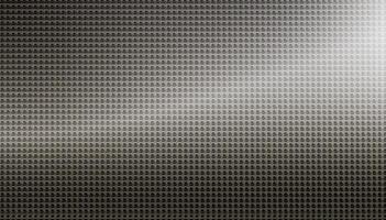 Spot lit perforated metal plate photo