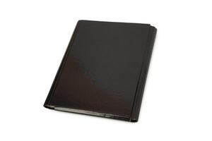 Black leather folder isolated on white background photo