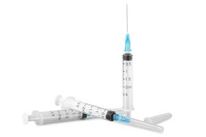 syringe isolated on white background photo