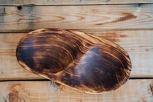 an oval textured platter is on the table photo