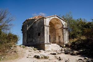 Ancient building of stone, the mausoleum of the princess. Architectural structure made of stone. ancient places photo