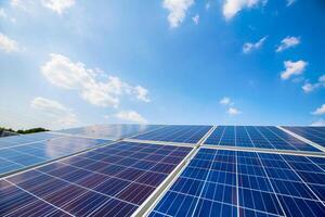 Solar panels on the sky background. Solar power plant. Blue solar panels. Alternative source of electricity. photo