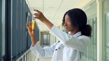 Young african american doctor preparing syringe for injection. Close up of african american doctor in hospital video