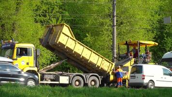 Ternopil, Ukraine, May 2020. Road workers are repairing the road video