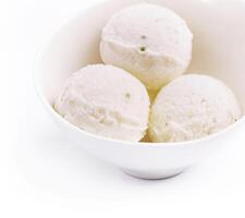 Pistachio ice cream on a bowl photo