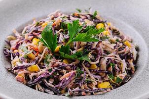 Fresh red cabbage salad with corn photo