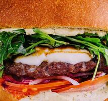 big and tasty burger with arugula photo