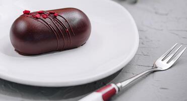 chocolate cheesecake dessert on plate close up photo