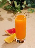 Citrus juice with orange and grapefruit top view photo