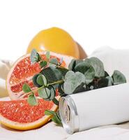 soda in a tin with oranges, grapefruits and pomegranate photo