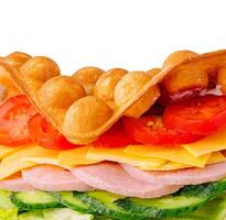 Belgian waffles with ham, cheese and salad closeup photo