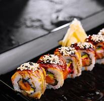 Traditional canada sushi roll on plate photo