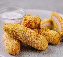 Chicken golden nuggets in plate photo