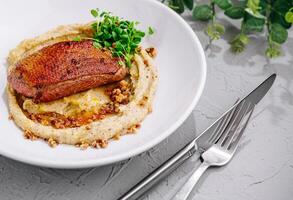 Duck breast steak with potato mashed photo