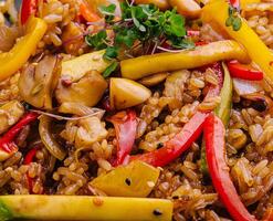 Chinese fried rice with vegetables close up photo