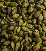 Close up of the pumpkin seeds closeup photo