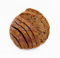 Flat-lay of freshly baked sourdough bread loaf and bread slices photo