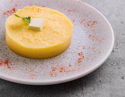 Mashed Potatoes with Butter on plate photo