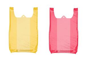 yellow and red plastic bags isolated on white background photo