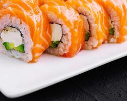 Sushi roll philadelphia with salmon close up photo