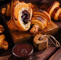 croissant filled with chocolate top view photo
