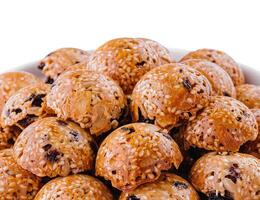 Caramel sweets with sunflower seeds on plate photo