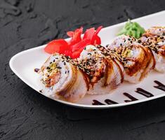 Sushi set canada roll with salmon on plate photo