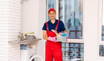 Master repairs the broken washing machine photo