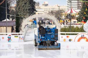 special machine ice harvester cleans the ice rink. transport industry photo