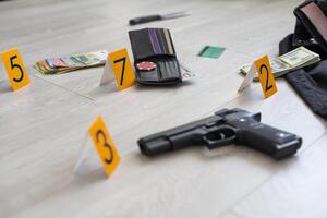 evidence markers and objects on floor of residential apartment photo