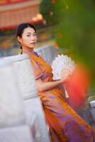 Chinese woman in traditional costume for Happy chinese new year concept photo