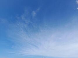 The white clouds on the blue sky are perfect for the background. Skyscape on Lombok Island, Indonesia photo