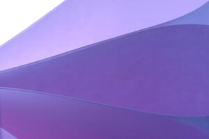 Abstract lilac macro background smooth lines of paper sheets. photo