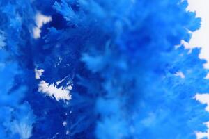 Macro image blue salt crystal on white background. photo