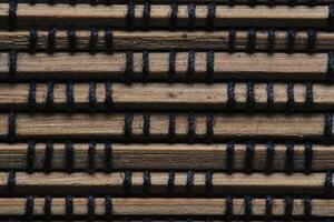 Brown background made of braided wooden slats. photo