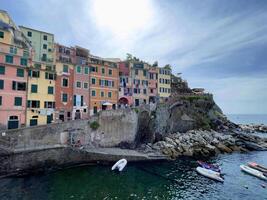 a colorful village on the coast of italy photo