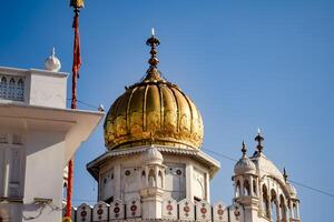 View of details of architecture inside Golden Temple - Harmandir Sahib in Amritsar, Punjab, India, Famous indian sikh landmark, Golden Temple, the main sanctuary of Sikhs in Amritsar, India photo