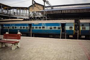 Amritsar, India, February 03 2024 - Indian railway train at Amritsar railway station platform during morning time, Colourful train at Amritsar, Punjab railway station photo