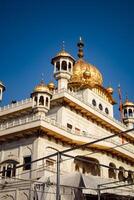 View of details of architecture inside Golden Temple - Harmandir Sahib in Amritsar, Punjab, India, Famous indian sikh landmark, Golden Temple, the main sanctuary of Sikhs in Amritsar, India photo