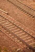 View of train Railway Tracks from the middle during daytime at Kathgodam railway station in India, Train railway track view, Indian Railway junction, Heavy industry photo