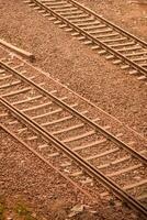 View of train Railway Tracks from the middle during daytime at Kathgodam railway station in India, Train railway track view, Indian Railway junction, Heavy industry photo