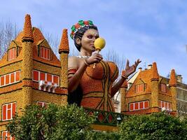 a statue of a woman holding an ice cream photo