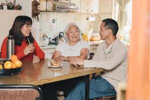 An Argentine family of Japanese ethnicity enjoying mate together at home. photo