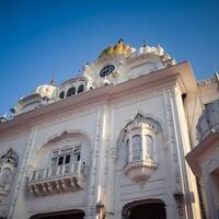 View of details of architecture inside Golden Temple - Harmandir Sahib in Amritsar, Punjab, India, Famous indian sikh landmark, Golden Temple, the main sanctuary of Sikhs in Amritsar, India photo