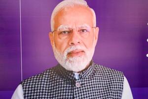 New Delhi, India - February 17 2024 - Prime Minister Narendra Modi cut out during BJP road show, the statue of PM Modi while attending a big election rally in the capital photo