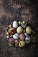 Easter eggs painted with natural dye photo