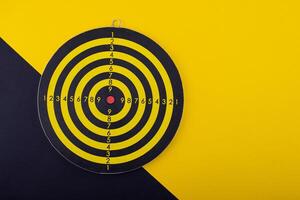 Target and goal concept with darts and arrows photo